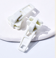Lightweight plastic pull tab