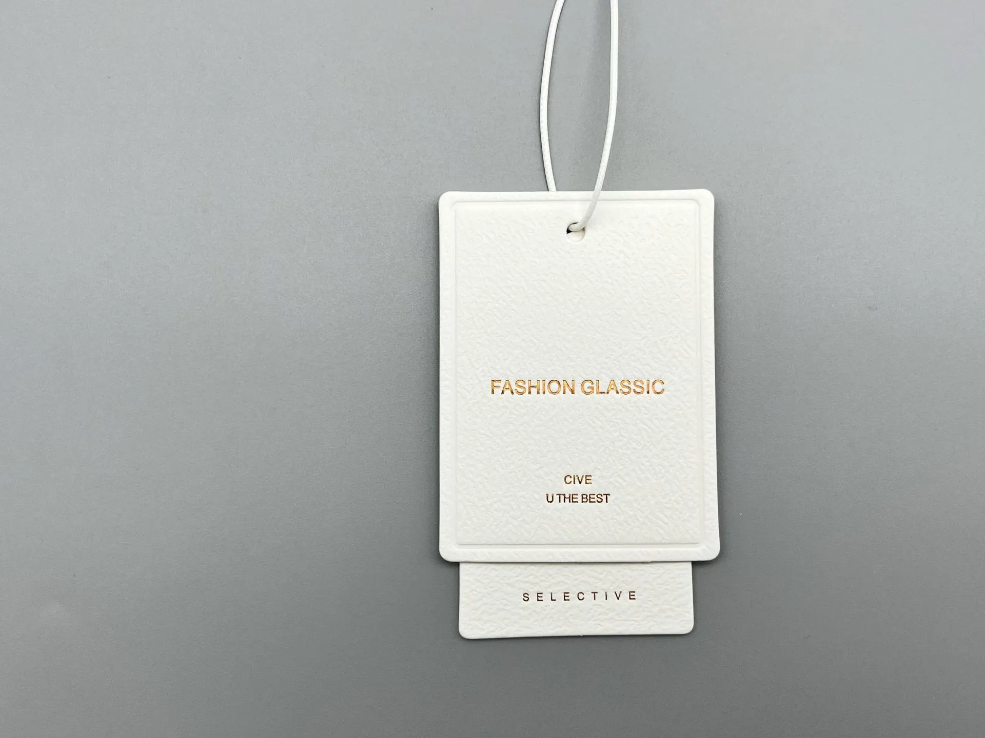 Hot stamping pressure pattern hang tag